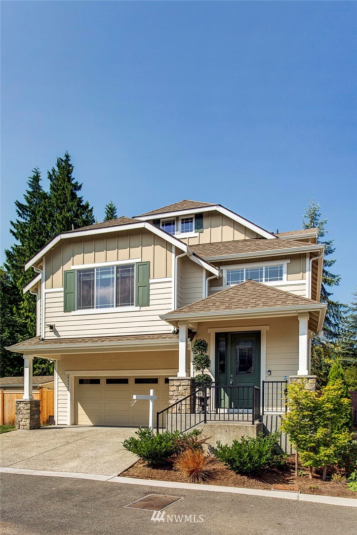22326 9th Drive Southeast Bothell, WA 98021 - Photo 2 of 40 a front view of a house with a yard