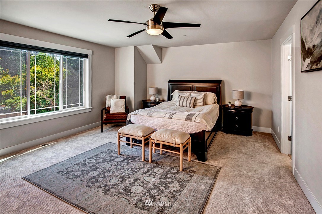 22326 9th Drive Southeast Bothell, WA 98021 - Photo 19 of 40 a bed sitting in a bedroom next to a window