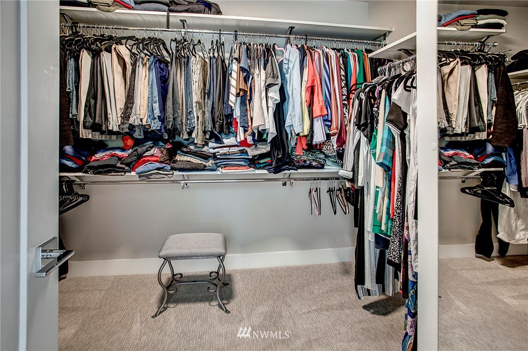 22326 9th Drive Southeast Bothell, WA 98021 - Photo 24 of 40 a view of walk in closet with clothes