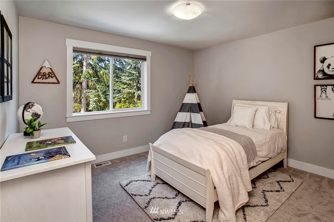 22326 9th Drive Southeast Bothell, WA 98021 - Photo 25 of 40 a bedroom with a bed and a window