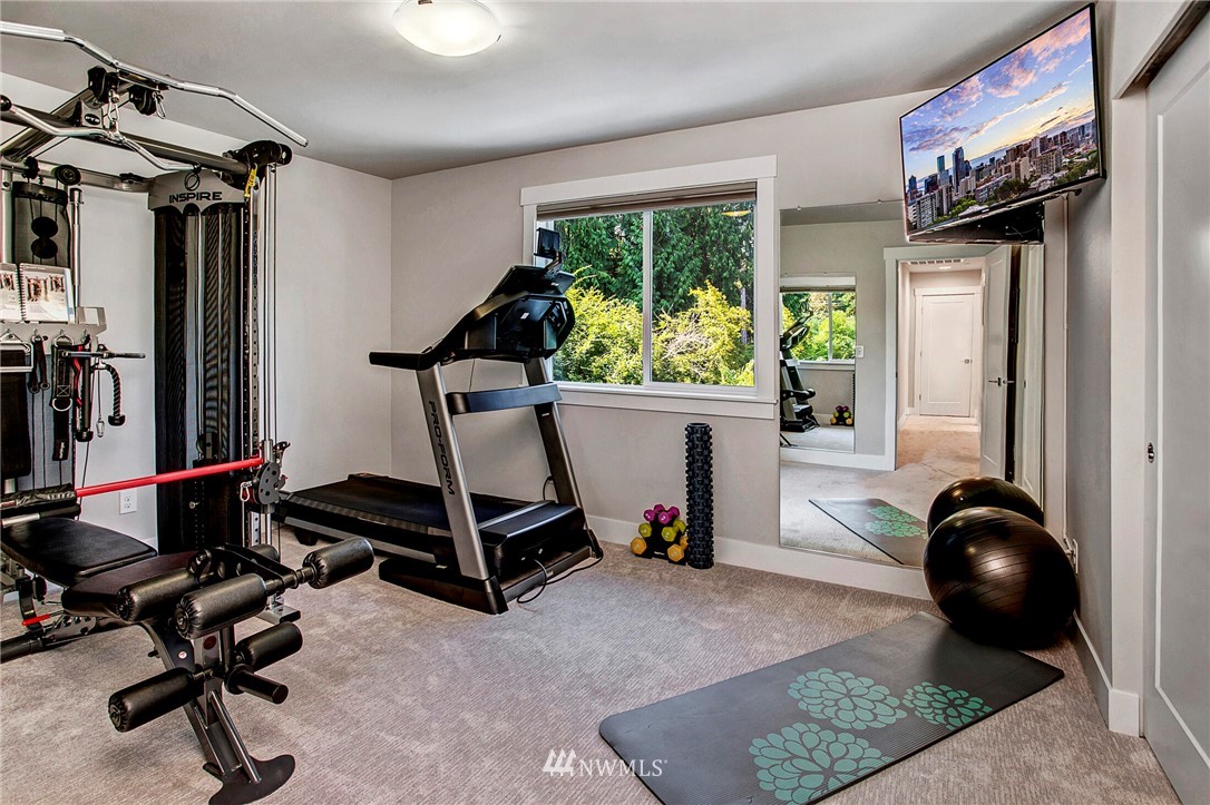 22326 9th Drive Southeast Bothell, WA 98021 - Photo 26 of 40 a room with gym equipment and a large window