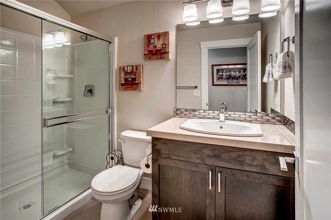 22326 9th Drive Southeast Bothell, WA 98021 - Photo 31 of 40 a bathroom with a sink toilet and shower
