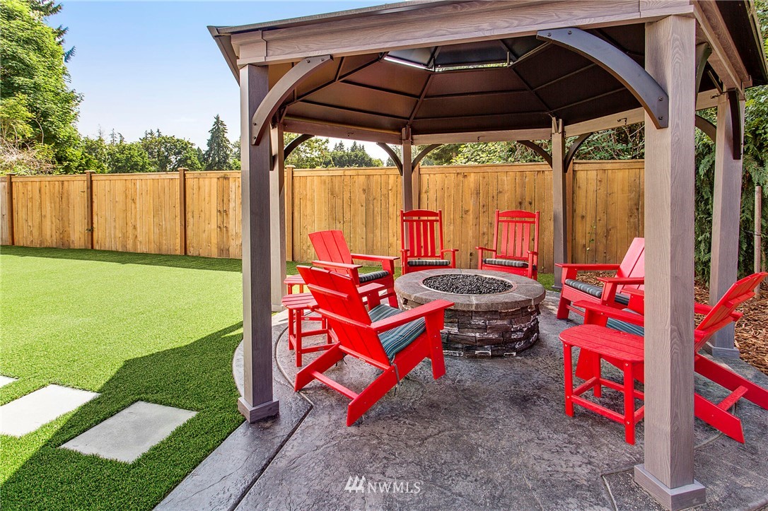 22326 9th Drive Southeast Bothell, WA 98021 - Photo 33 of 40 a backyard of a house with outdoor seating