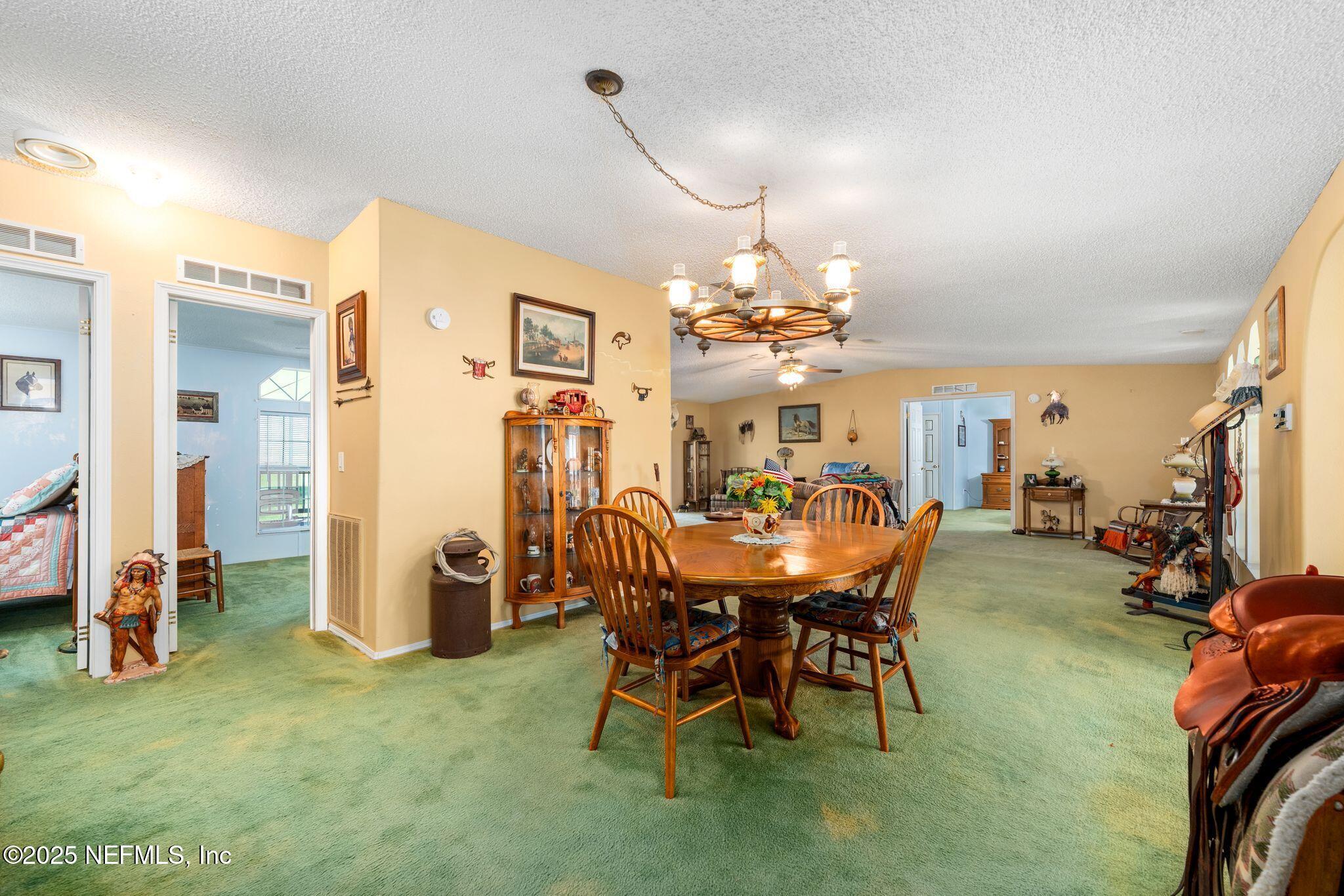 27061 29th Road Branford, FL 32008 - Photo 30 of 49 dining to living area