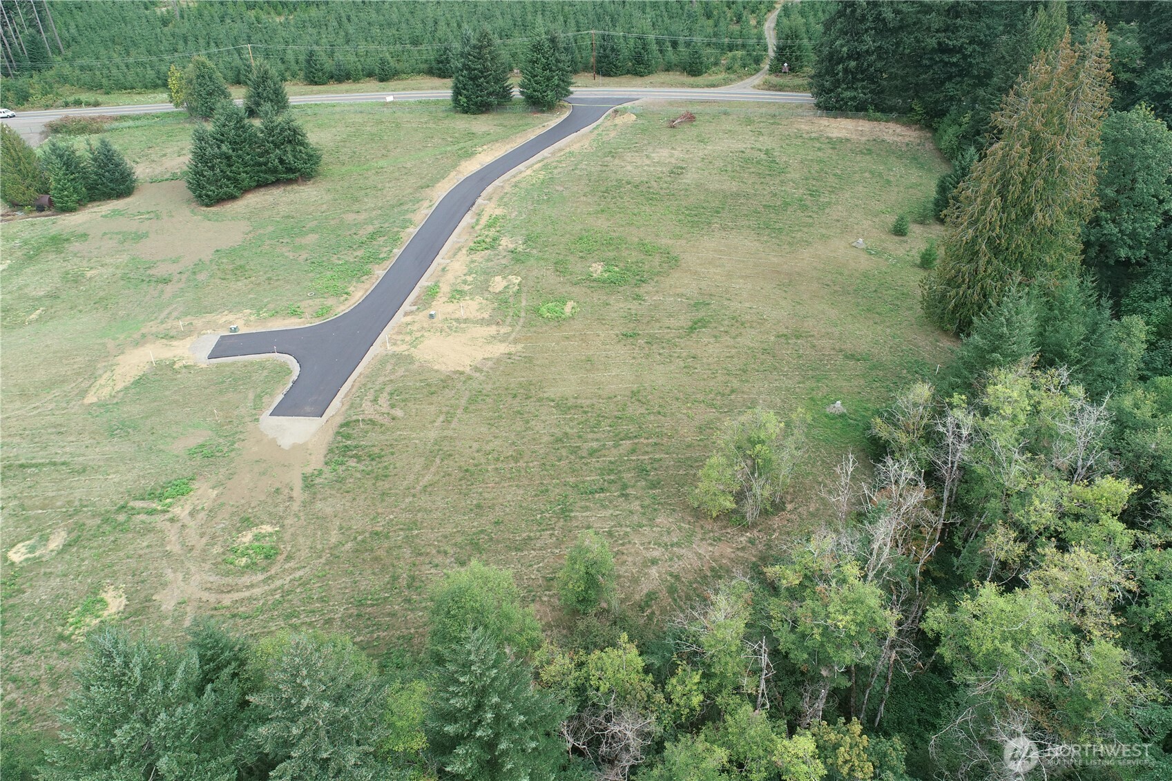 a view of a yard with an outdoor space