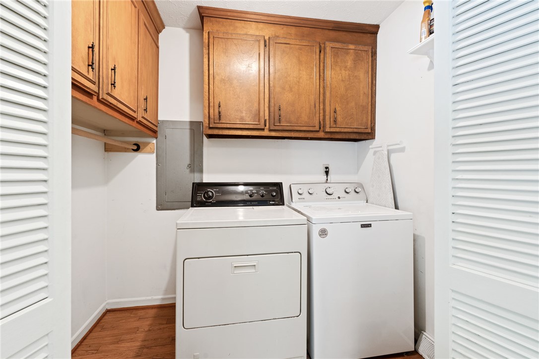200 Echo Circle Easley, SC 29642 - Photo 21 of 35 Functional laundry room equipped with upper cabinetry and practical hard flooring.