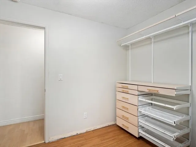 a view of an empty walk in closet