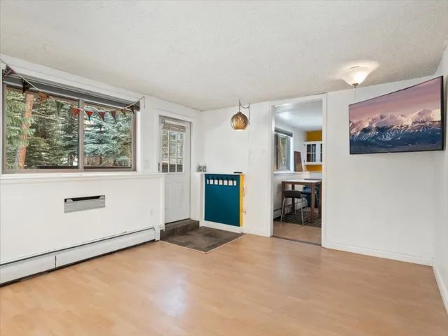 a view of a livingroom with a workspace