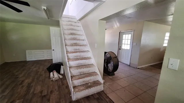 a view of entryway with wooden floor