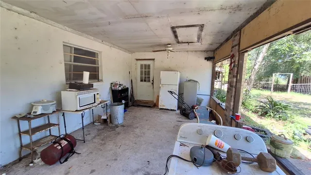 a room with furniture and a window