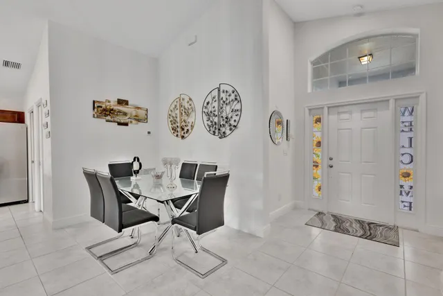 a view of a hallway with seating area