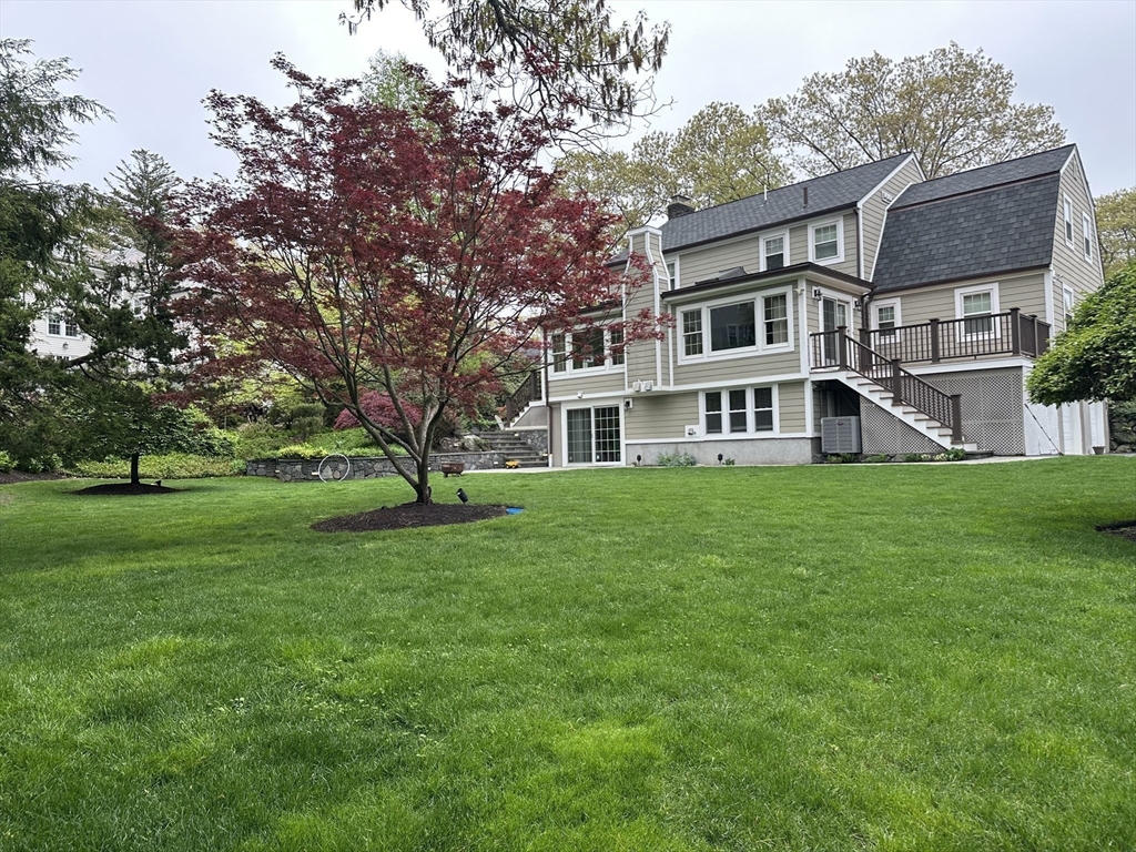 45 Wellesley Road Belmont, MA 02478 - Photo 37 of 39 a front view of house with yard and green space