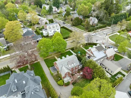 an aerial view of residential house with outdoor space