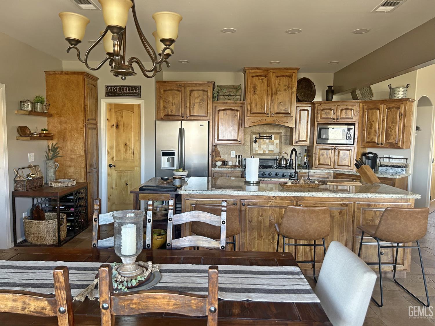 Undisclosed Address Lake Isabella, CA 93240 - Photo 12 of 40 a kitchen with stainless steel appliances granite countertop a sink and cabinets
