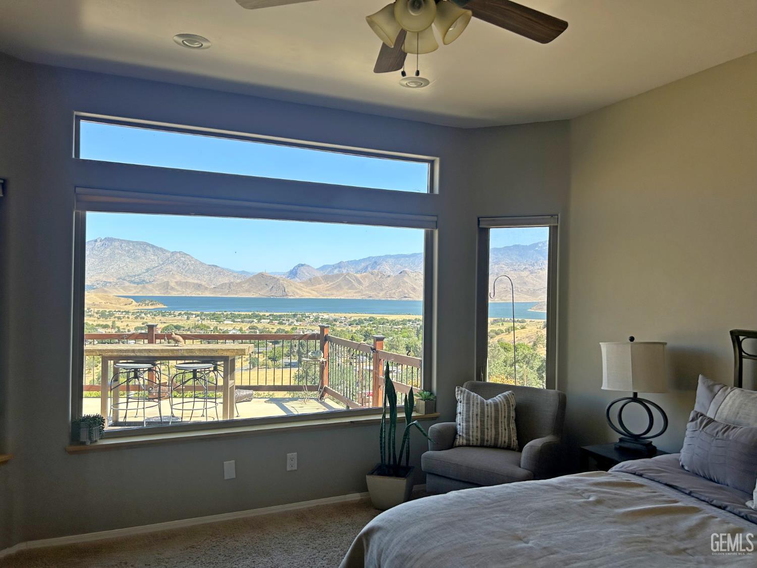Undisclosed Address Lake Isabella, CA 93240 - Photo 18 of 40 a living room with furniture and floor to ceiling windows