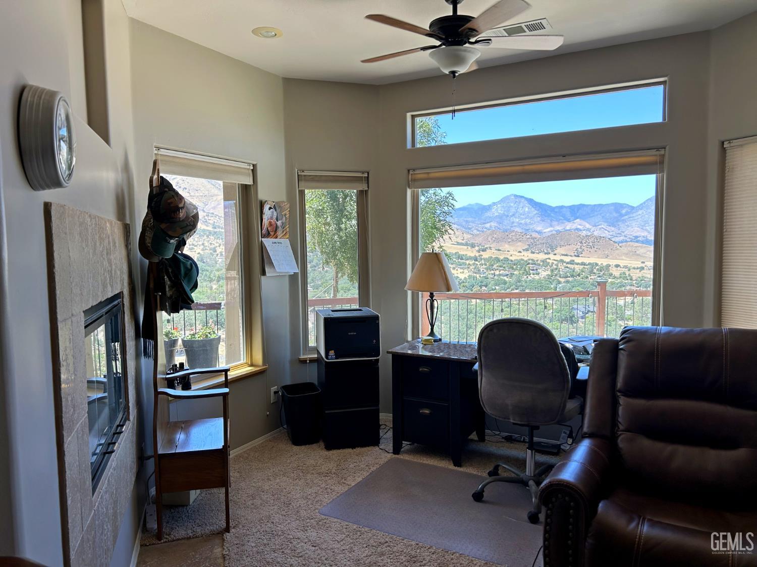 Undisclosed Address Lake Isabella, CA 93240 - Photo 22 of 40 a view of livingroom with furniture and a fireplace