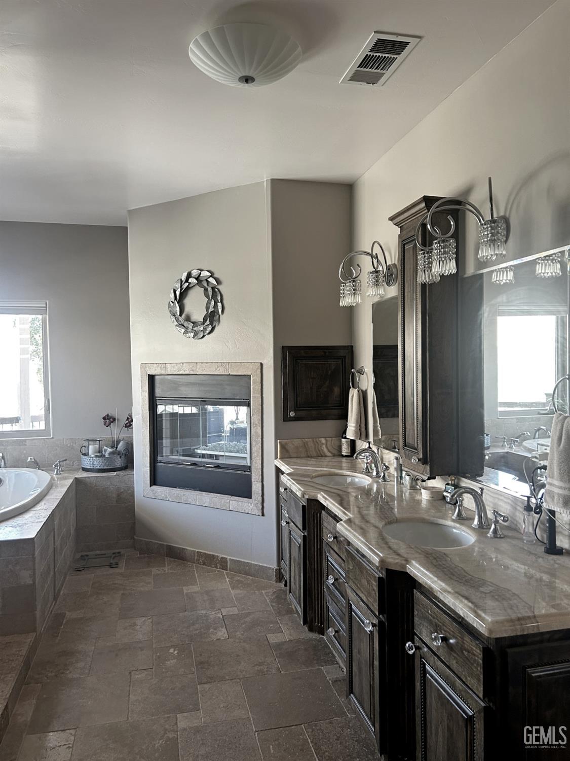 Undisclosed Address Lake Isabella, CA 93240 - Photo 23 of 40 a large kitchen with a stove and a sink