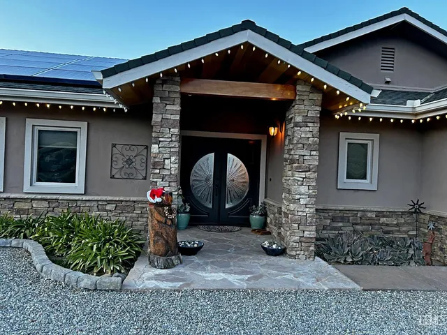 a front view of a house with entryway
