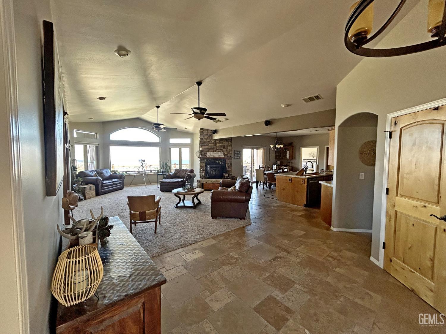 Undisclosed Address Lake Isabella, CA 93240 - Photo 5 of 40 a living room with furniture a large window and stainless steel appliances