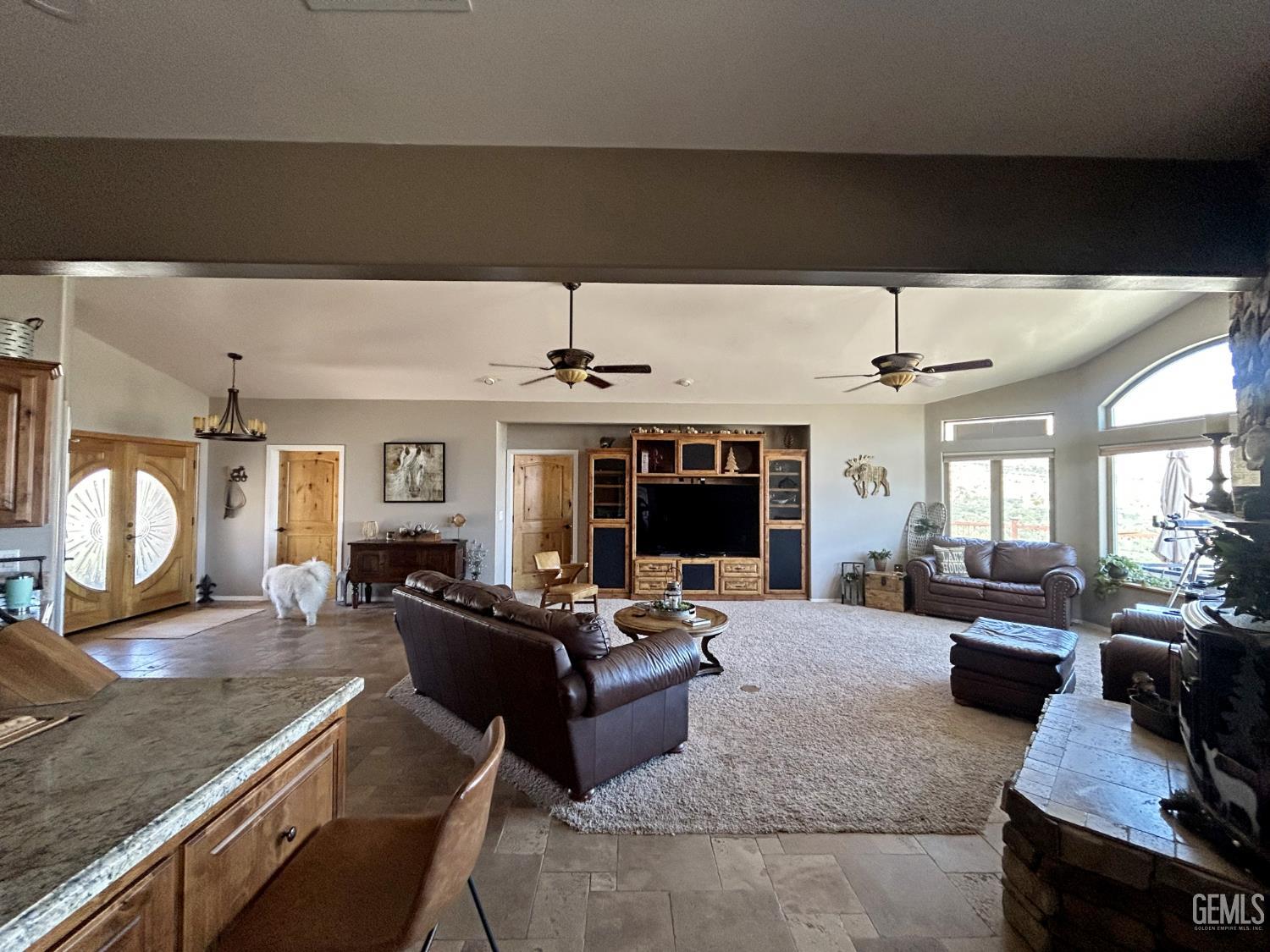 Undisclosed Address Lake Isabella, CA 93240 - Photo 8 of 40 a living room with furniture and a fireplace