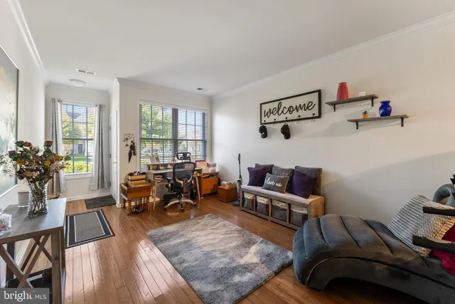 a living room with furniture and a couch
