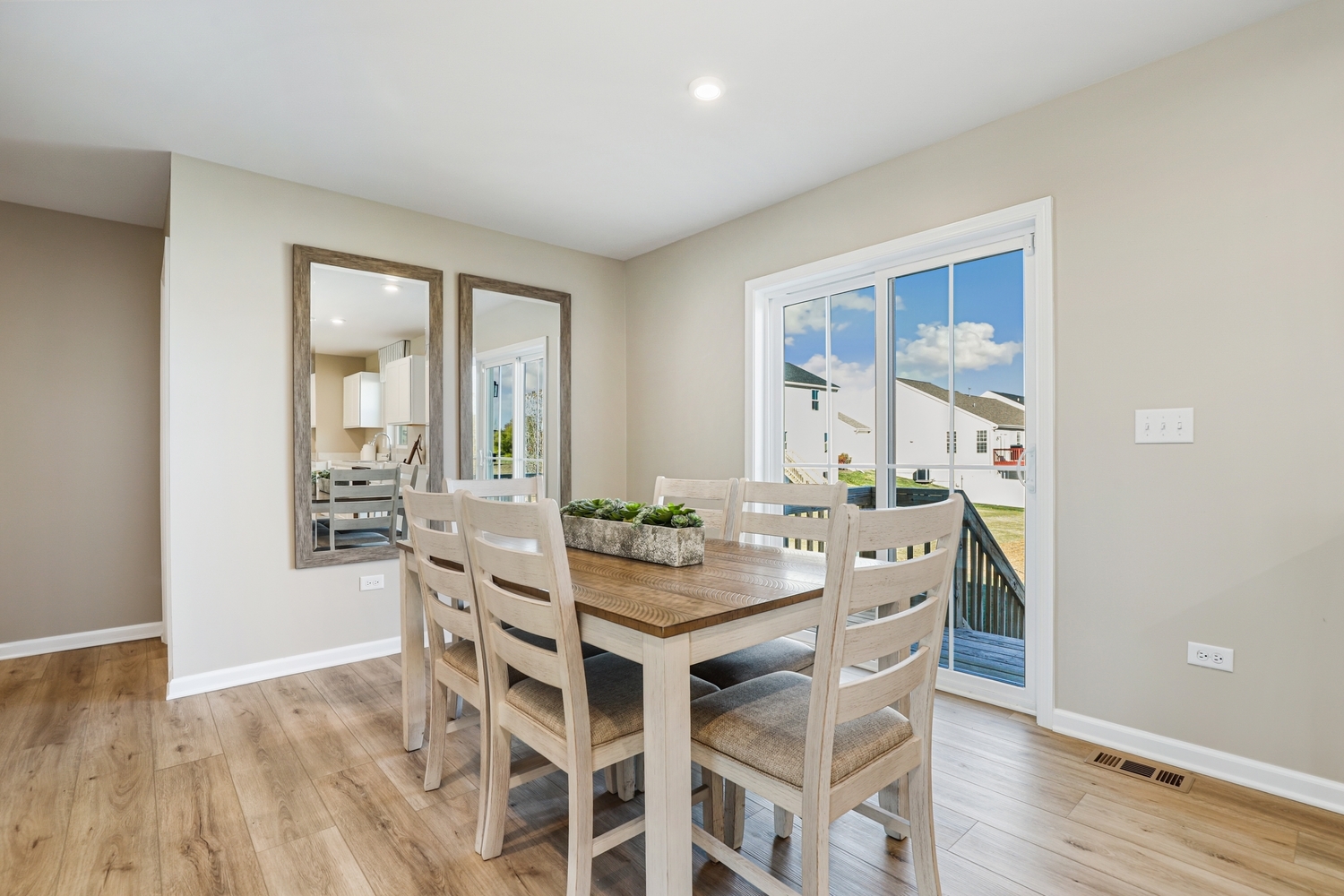 1725 Sunglow Lane DeKalb, IL 60115 - Photo 6 of 20 a view of a dining room with furniture and wooden floor