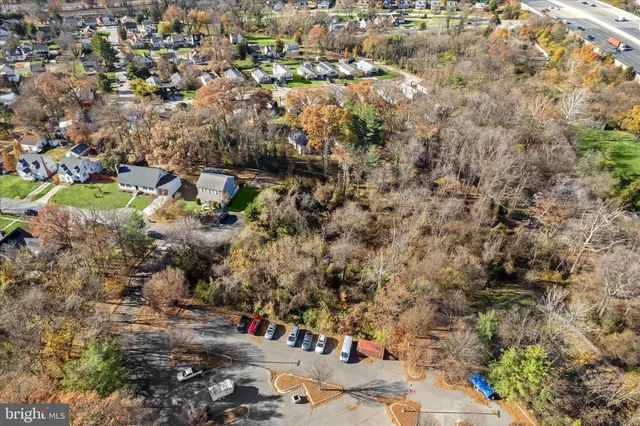 an aerial view of residential house with parking space