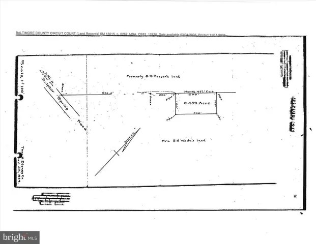 an aerial view of a house with a lake view