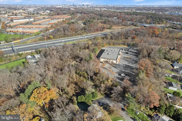 an aerial view of residential house with outdoor space
