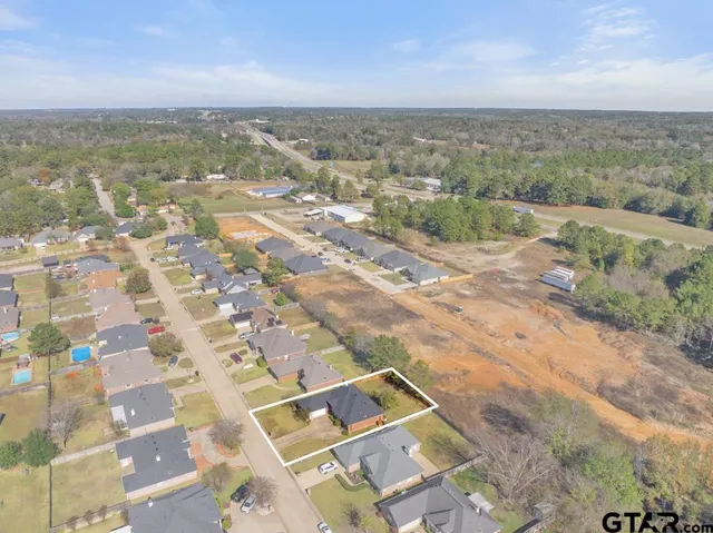 a picture of a bathroom with a shower