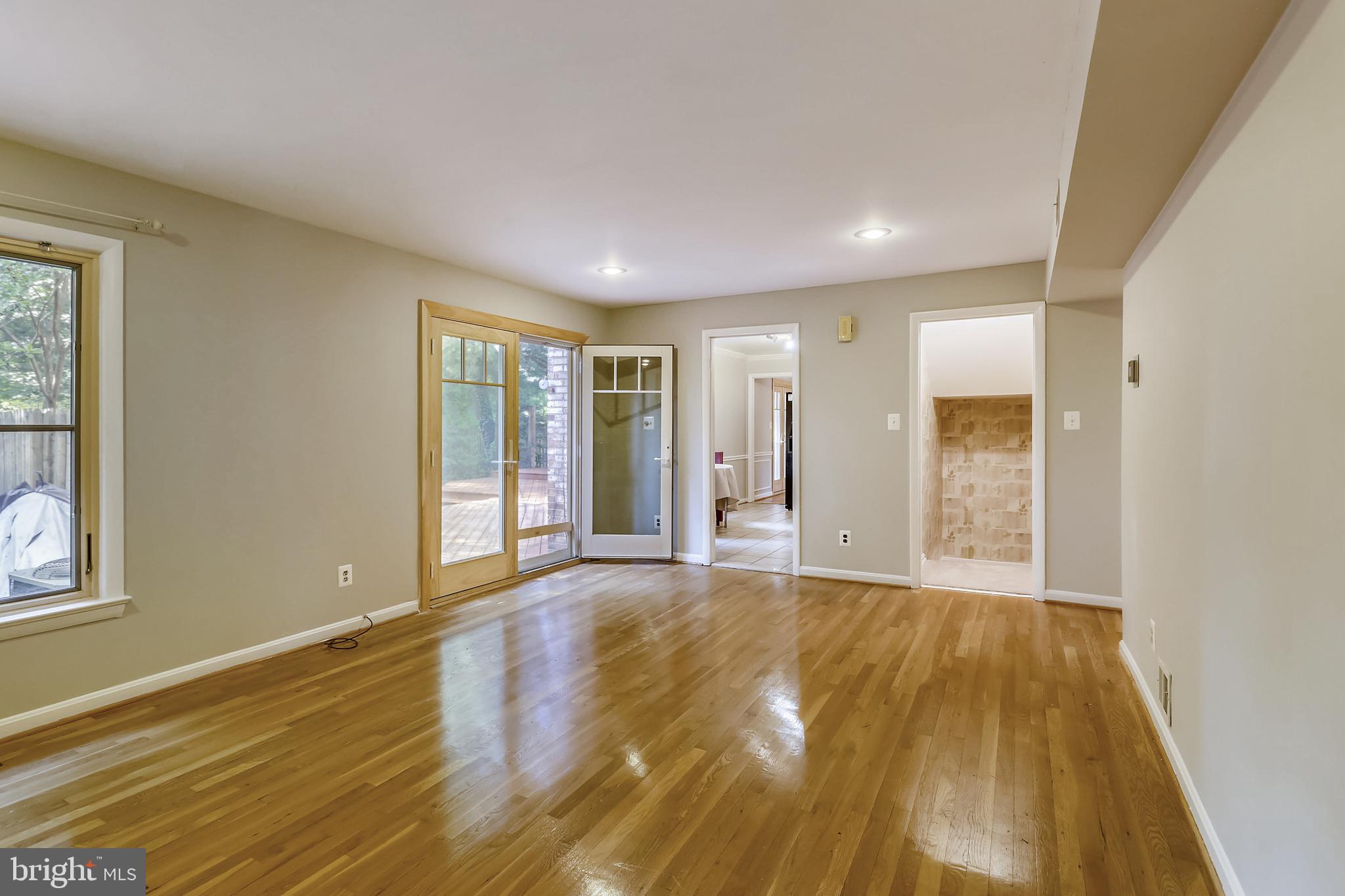 11909 Seven Locks Road Potomac, MD 20854 - Photo 11 of 43 Family room has access to deck