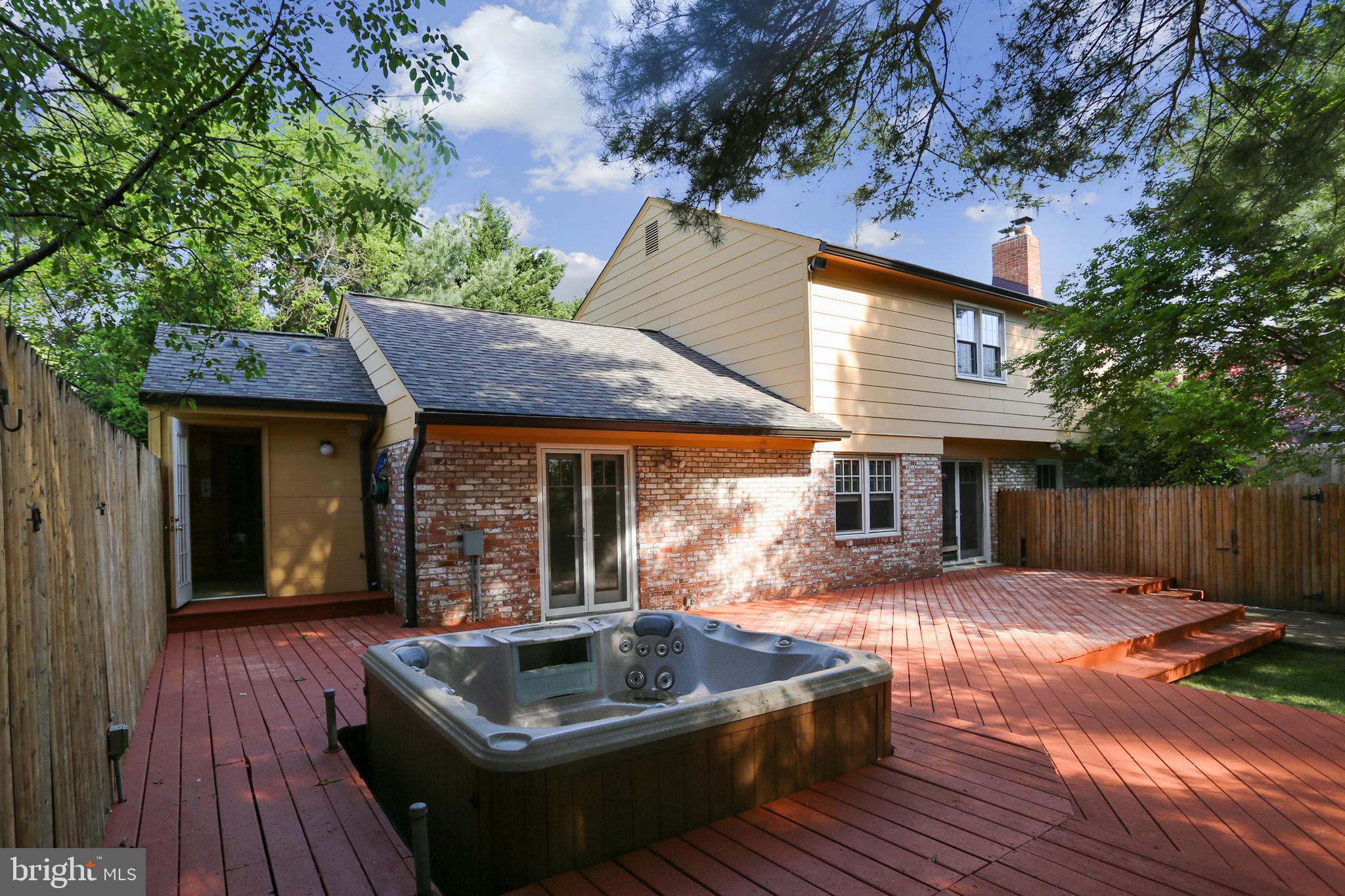 11909 Seven Locks Road Potomac, MD 20854 - Photo 37 of 43 Deck with Hot Tub and Sauna