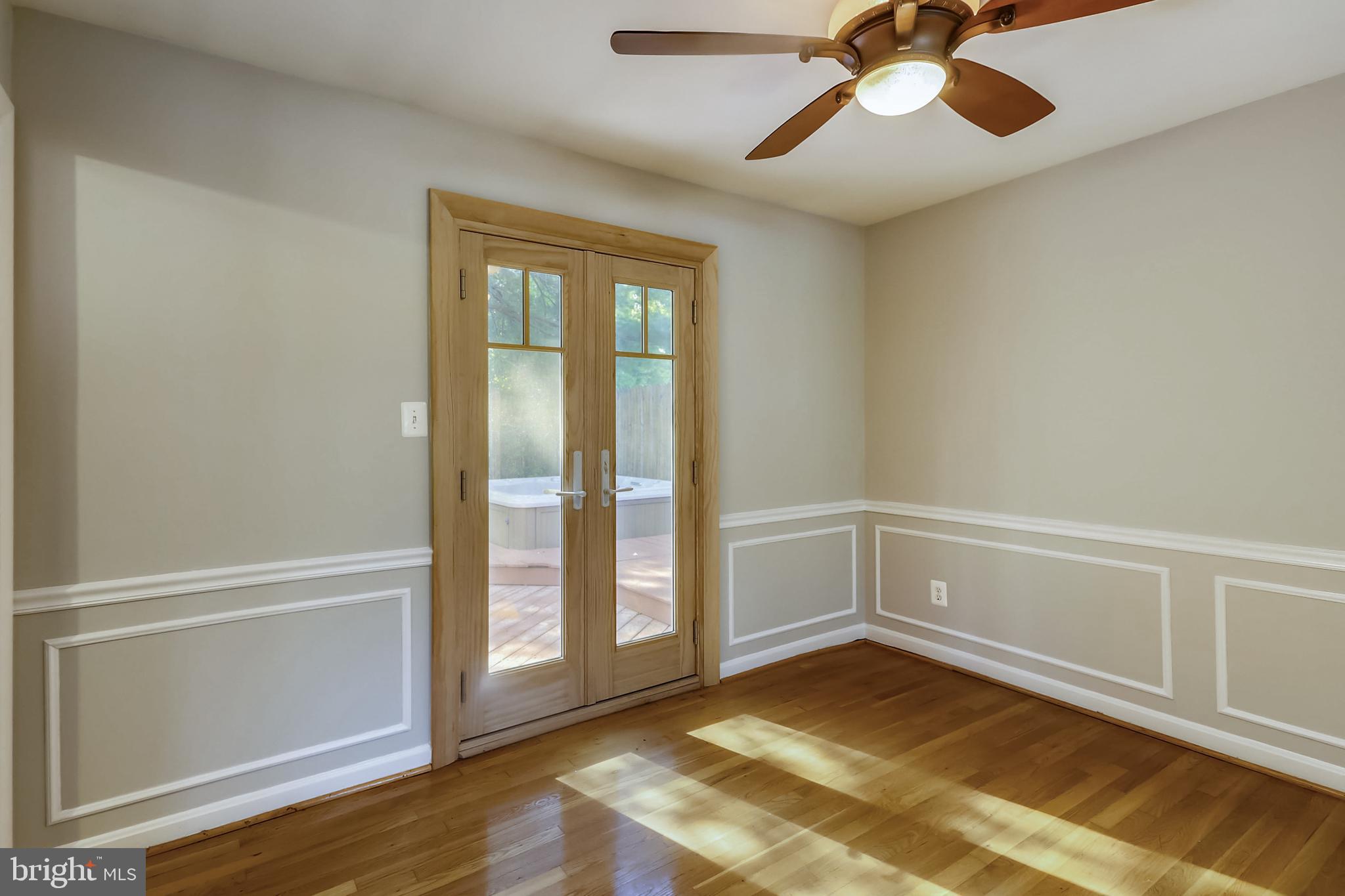 11909 Seven Locks Road Potomac, MD 20854 - Photo 7 of 43 Double doors to large deck