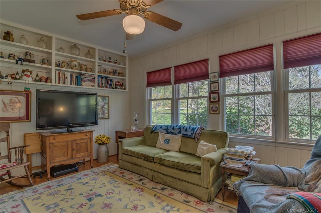 194 Harris Street Rutherfordton, NC 28139 - Photo 14 of 24 a living room with furniture and a flat screen tv