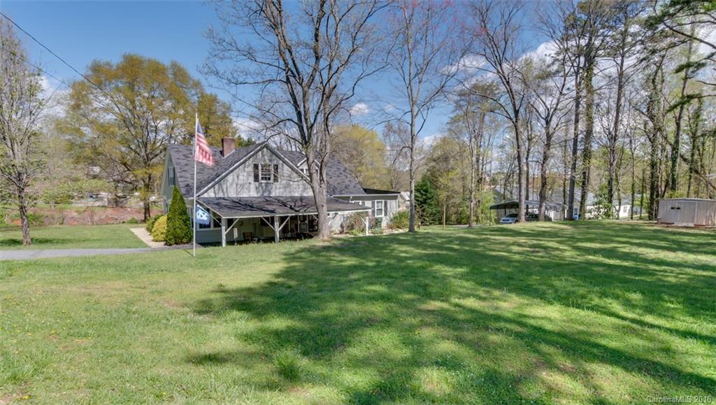 194 Harris Street Rutherfordton, NC 28139 - Photo 3 of 24 a view of a house with a big yard