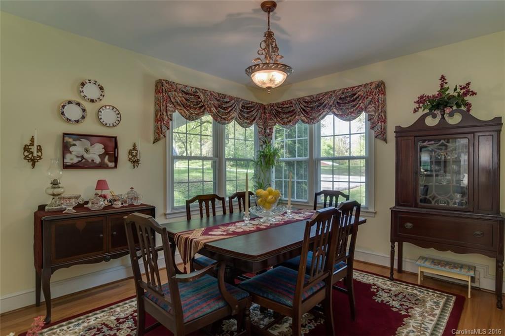 194 Harris Street Rutherfordton, NC 28139 - Photo 8 of 24 a view of a dining room with furniture window and outside view