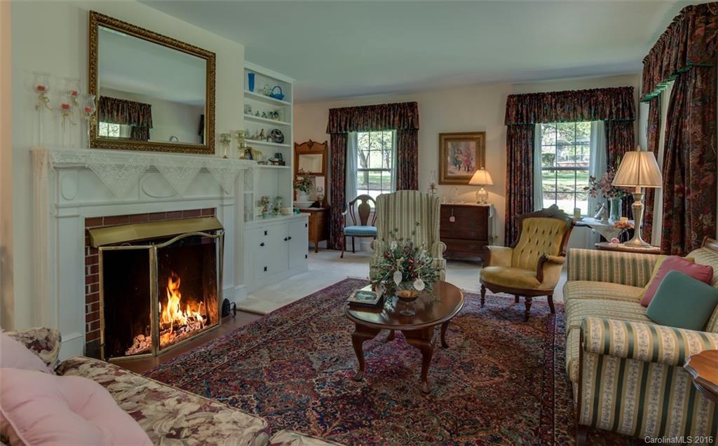 194 Harris Street Rutherfordton, NC 28139 - Photo 10 of 24 a living room with furniture and a fireplace