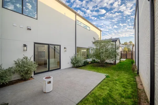 a view of a back yard of the house