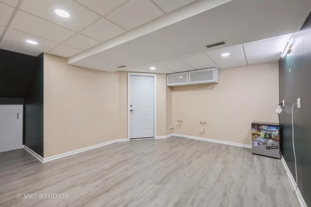a view of a livingroom with wooden floor