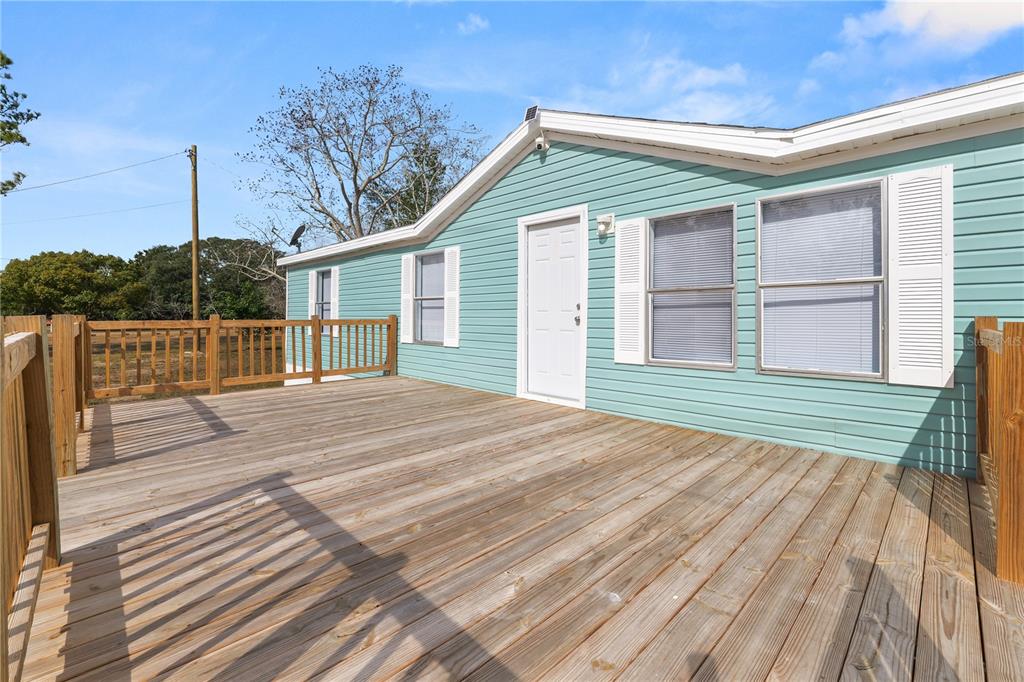 18805 St Paul Drive Spring Hill, FL 34610 - Photo 1 of 20 a view of outdoor space yard and deck