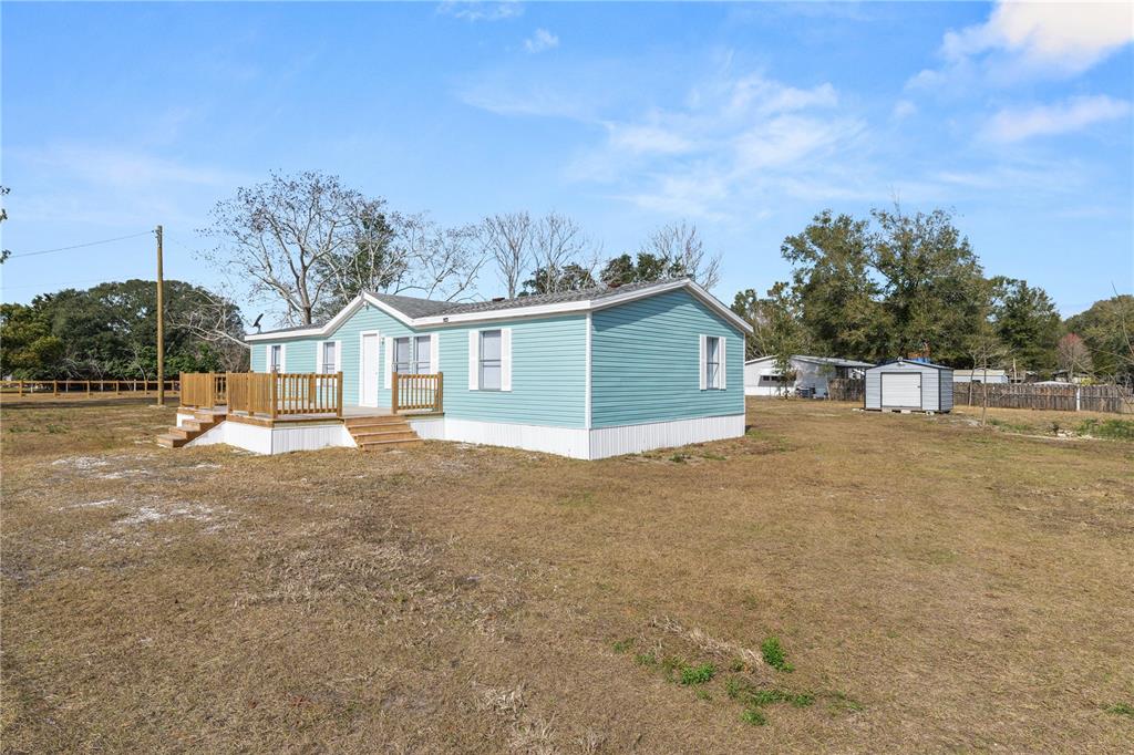 18805 St Paul Drive Spring Hill, FL 34610 - Photo 16 of 20 a view of backyard of house