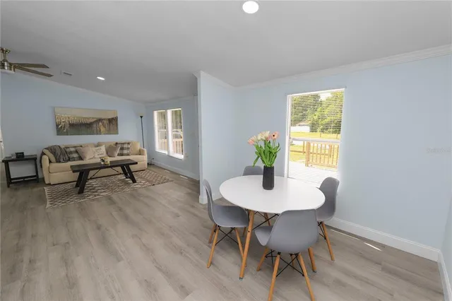 a workspace with furniture and a wooden floor