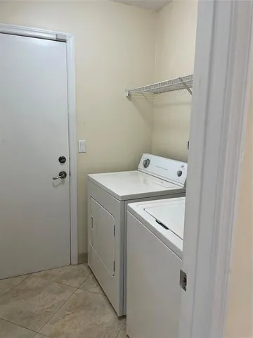 a view of a kitchen with a sink