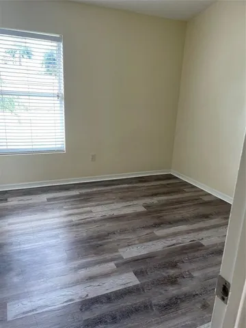 a view of a hallway with a bedroom