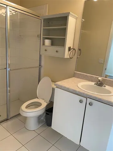 a bathroom with a sink a toilet and a bathtub