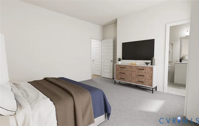 a bedroom with bed and flat screen tv