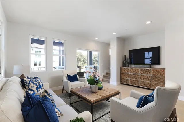 a kitchen with cabinets appliances a sink and a window