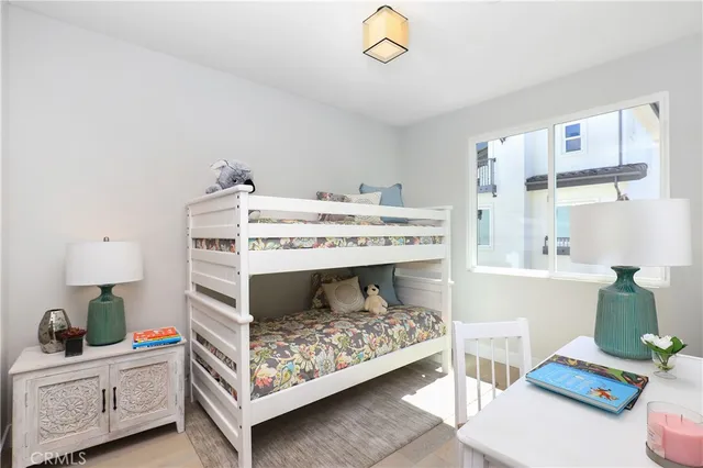 a bedroom with a bed and a couch