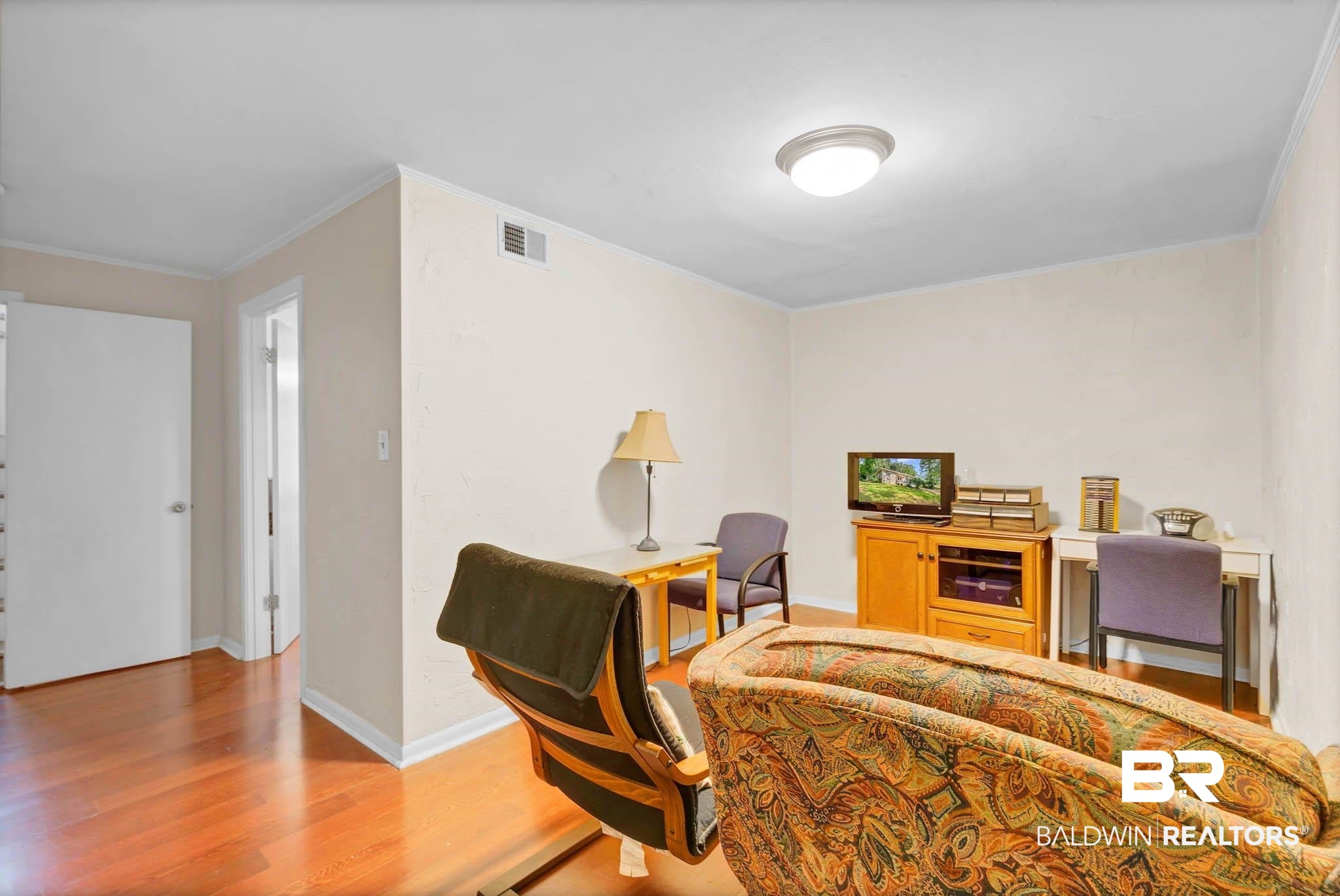 45 Caisson Trace Spanish Fort, AL 36527 - Photo 24 of 46 Home office featuring wood finished floors, crown molding, and baseboards