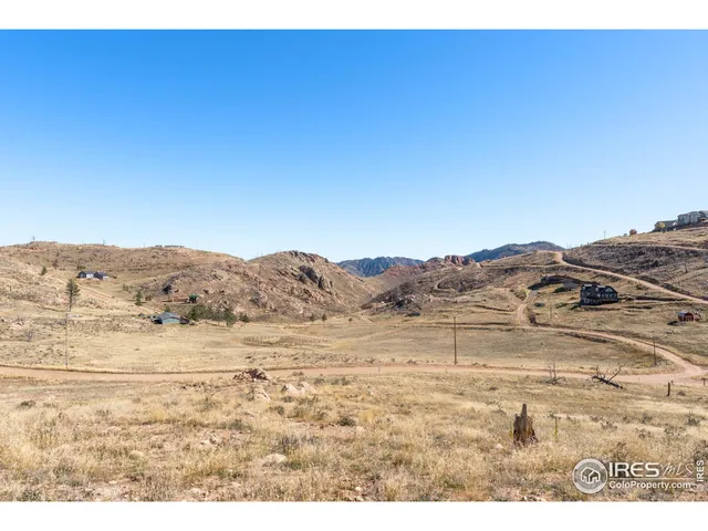 a view of mountain and tree
